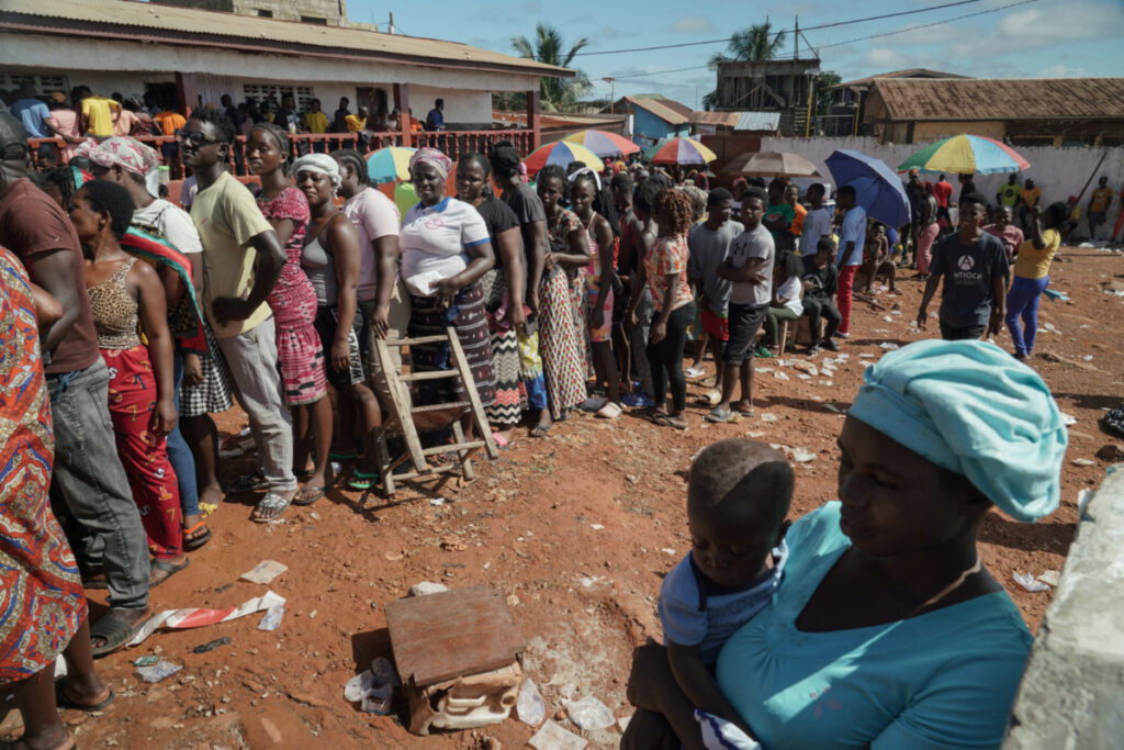 People wait to cast their votes during Liberia's presidential election in Monrovia, Liberia, on 10th October, 2023