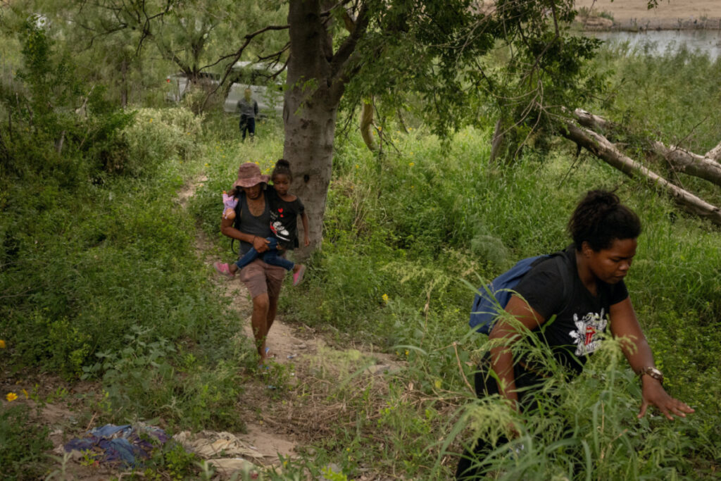 Migrants from Venezuela, including Luis, four-year-old Valentina and Carolina, return to Mexico after being deterred by local authorities from crossing the Rio Grande river into Eagle Pass, Texas, from Piedras Negras, Coahuila, Mexico, on 7th October, 2023