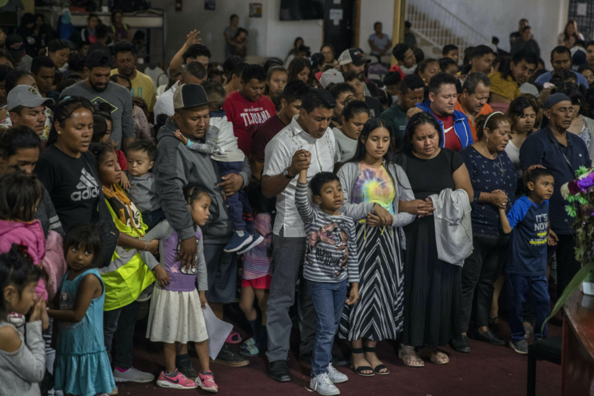 Mexican migrants, many from Michoacan state, attend a religious service at the "Embajadores de Jesus" Christian migrant shelter in Tijuana, Mexico, on Tuesday, 26th September, 2023.