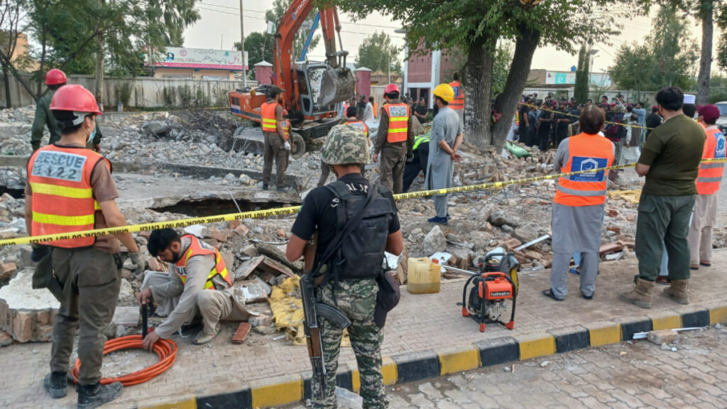 Rescue workers clear the rubble from a damaged mosque, after a suicide blast in Hangu, Pakistan, on 29th September, 2023.