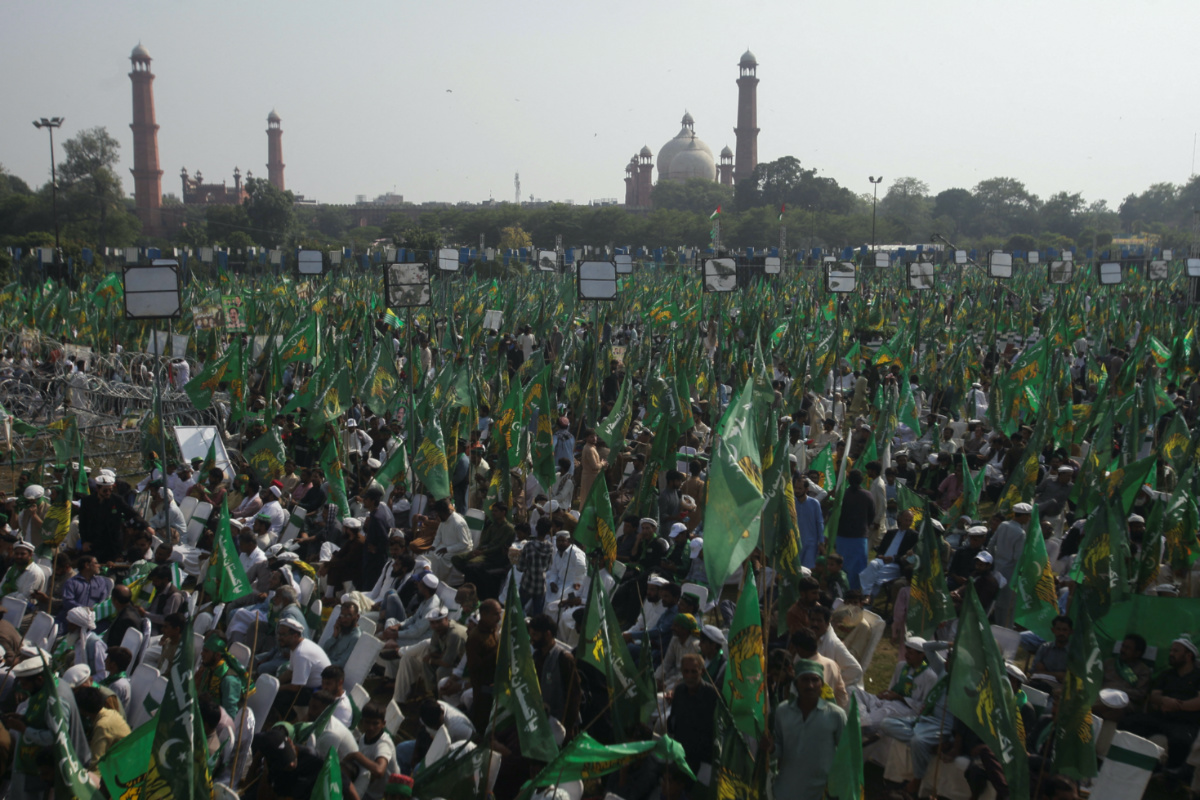 Supporters of Pakistan's former Prime Minister Nawaz Sharif gather at his arrival after self-imposed exile in London, ahead of the 2024 Pakistani general election, in Lahore, Pakistan, on 21st October, 2023