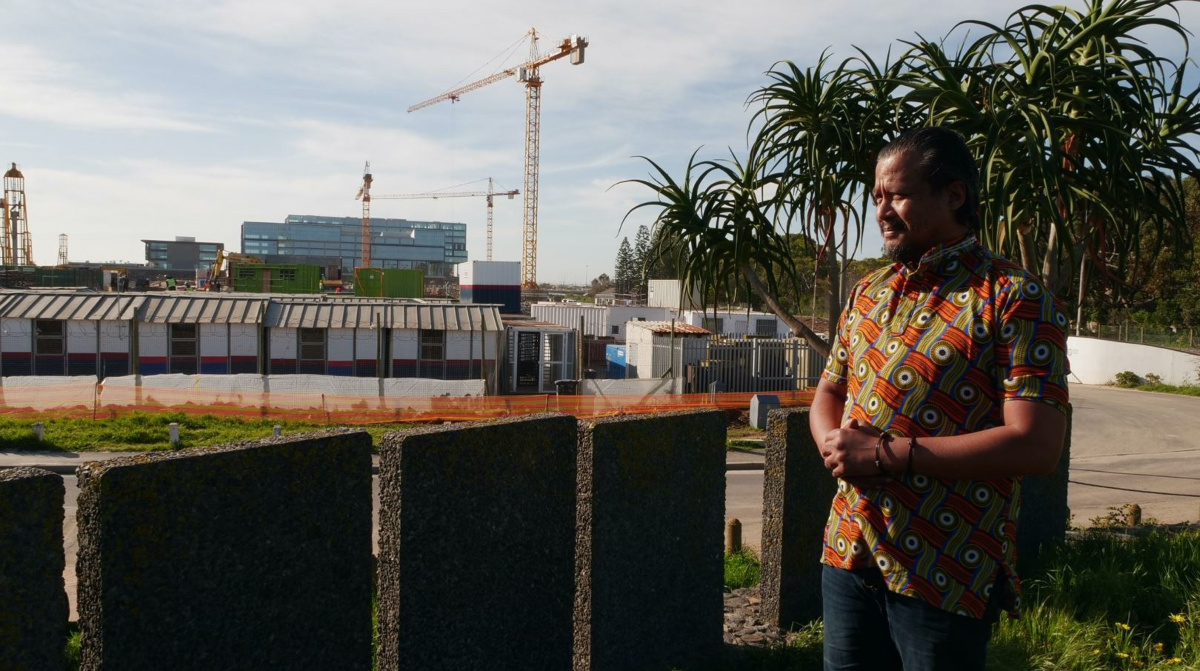 Tauriq Jenkins of the Goringhaicona Khoi Khoin Indigenous Traditional Council overlooks the Riverclub construction site in Cape Town, South Africa, on 7th September, 2023