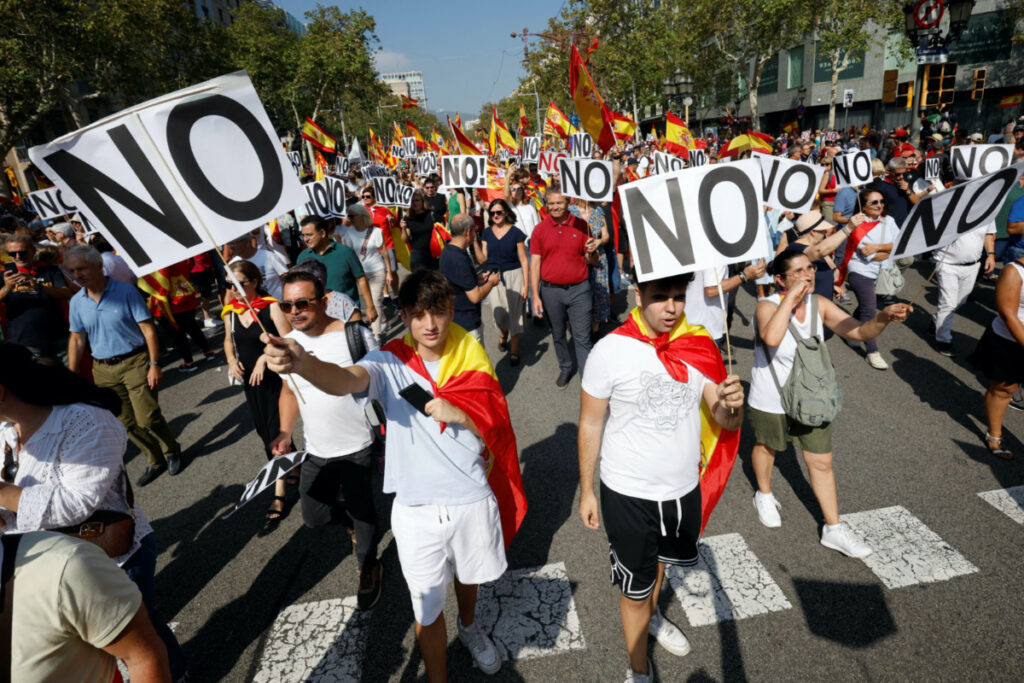 Unionist supporters protest against amnesty of separatist leaders and activists involved in the 2017 failed independence drive at Passeig de Gracia in Barcelona, Spain, on 8th October, 2023