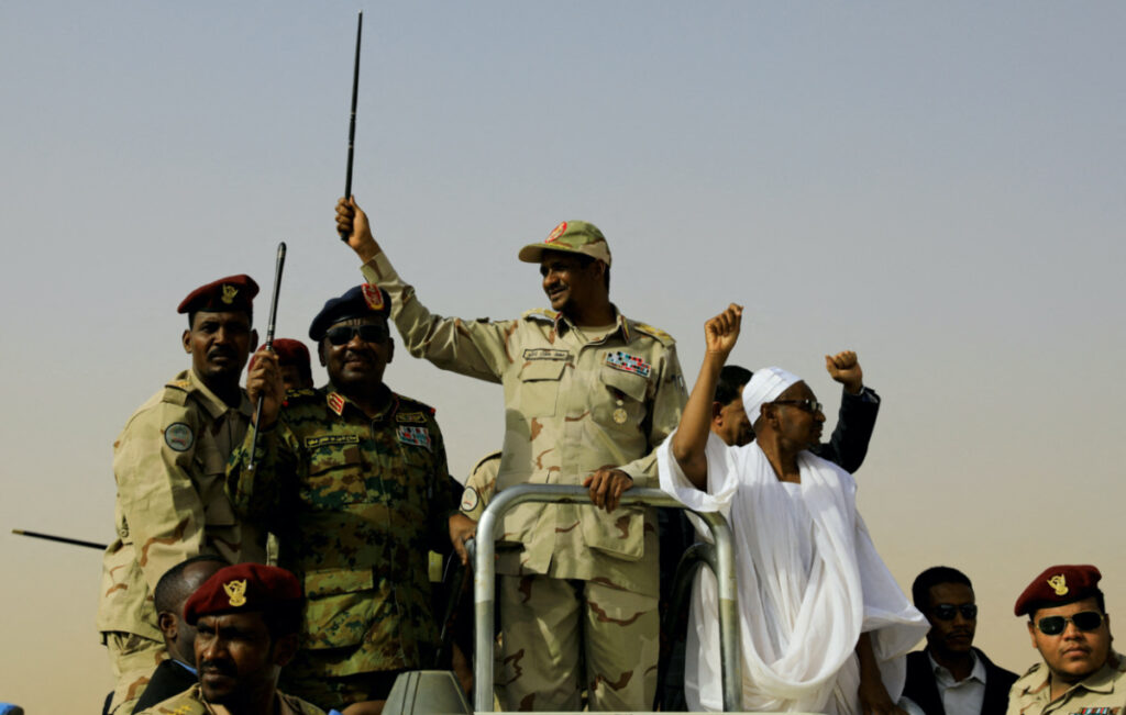 Lieutenant General Mohamed Hamdan Dagalo, deputy head of the military council and head of paramilitary Rapid Support Forces, greets his supporters as he arrives at a meeting in Aprag village, 60 kilometers away from Khartoum, Sudan, on 22nd June, 2019