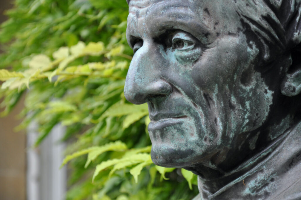 Close-up of Cardinal Newman bust from Trinity College Garden Quad, Oxford, United Kingdom.