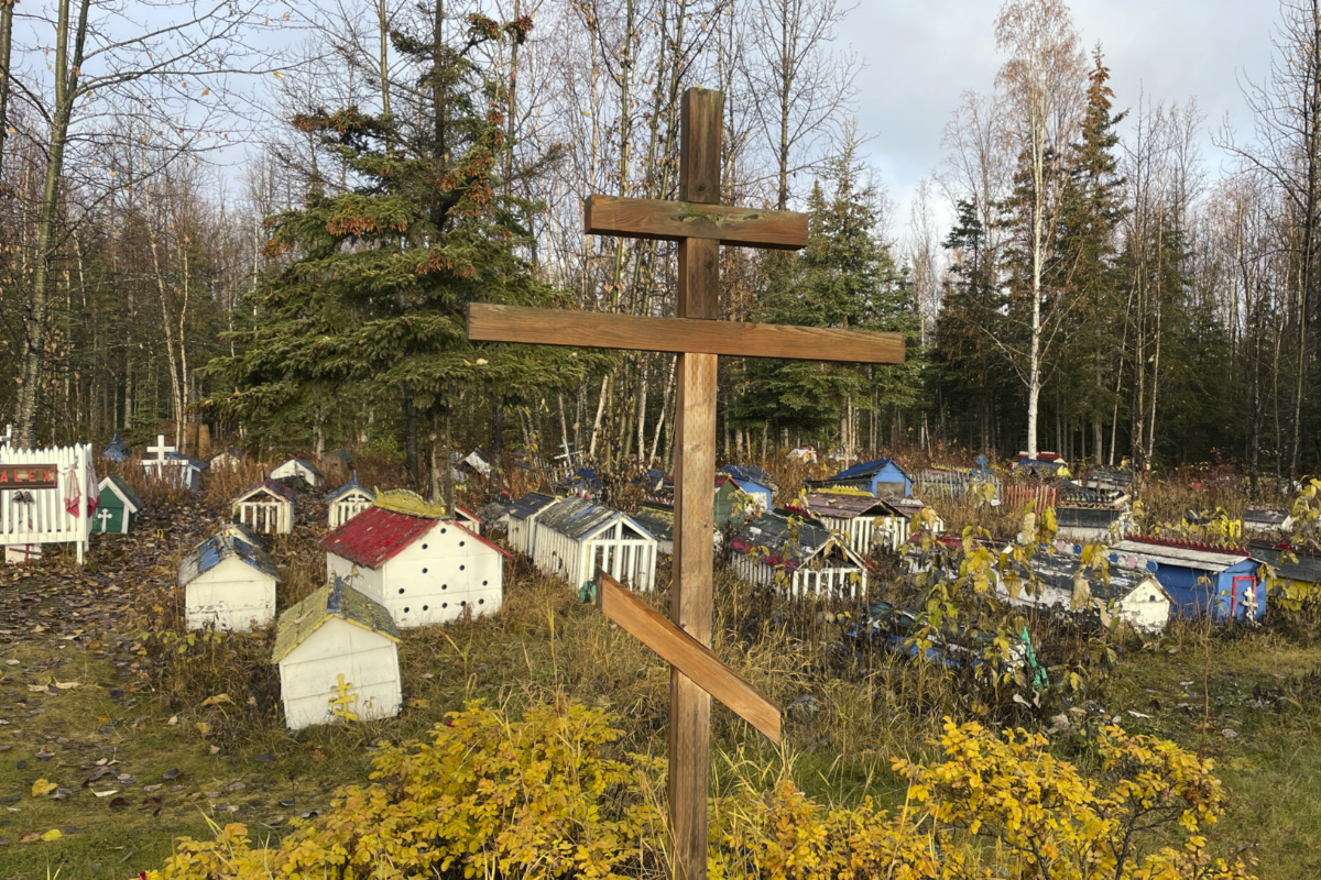 The cemetery at St Nicholas Church in Eklutna, Alaska, features a mixture of Russian Orthodox conventions like crosses featuring three cross beams and the Dena'ina Athabascan tradition of erecting spirit homes above the graves, on 13th October, 2023