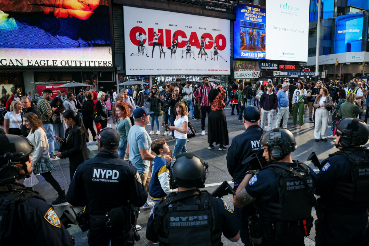 Members of the New York City Police Department counterterrorism unit patrol in Times Square, as the city takes security precautions ahead of planned demonstrations, in New York City, US, on 12th October, 2023
