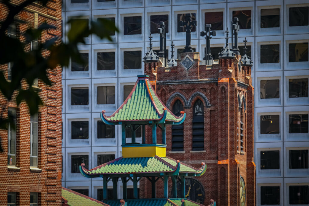 Historic Chinese pagoda and church tower of Old Saint Mary's Cathedral in Chinatown, downtown San Francisco, California