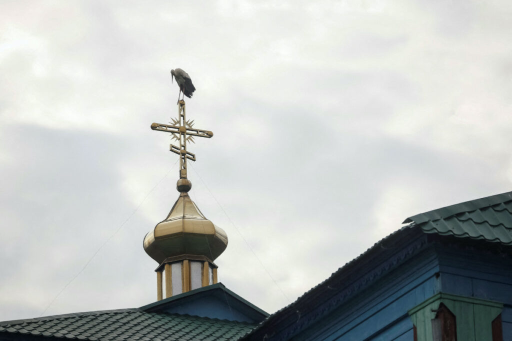 A stork sits on a cross of the church which switched from the Ukrainian Orthodox Church to the Orthodox Church of Ukraine, amid Russia's attack on Ukraine, in the village of Hrabivtsi, Vinnytsia region, Ukraine, on 23rd April, 2023