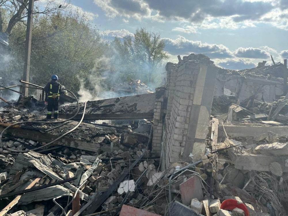 Firefighters work at a site of a Russian military strike, amid Russia's attack on Ukraine, in the village of Hroza, in Kharkiv region, Ukraine, on 5th October, 2023.