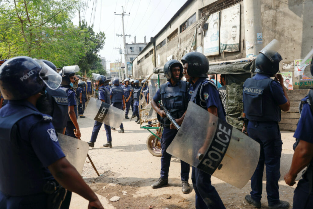 Security forces remain vigilant in front of the garment factories, following clashes between garment industry workers and police over pay, at the Ashulia area, outskirts of Dhaka, Bangladesh, on 8th November, 2023
