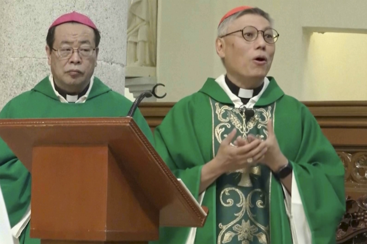 In this photo taken from video and released on 17th November, 2023 by Hong Kong Catholic Diocese, Beijing Bishop Joseph Li Shan, at left, and Hong Kong Bishop and Cardinal Stephen Chow during a ceremony at Hong Kong's Cathedral of the Immaculate Conception. 