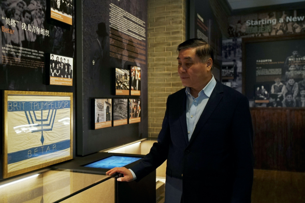 Curator Chen Jian gives a tour of the exhibition for the camera at the Shanghai Jewish Refugee Museum in Shanghai, China, on 17th November, 2023. 