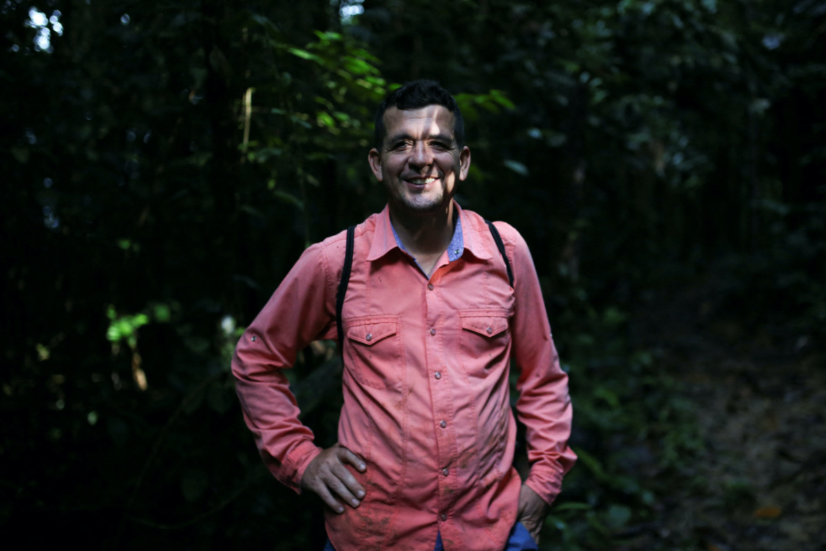 Jorge Santofimio, environmentalist and former guerrilla and signatory of the peace agreement between the Revolutionary Armed Forces of Colombia and the Colombian government, poses for a photo during a day of searching for seeds to reforest the jungles, in Puerto Guzman, Colombia, on 8th February, 2022