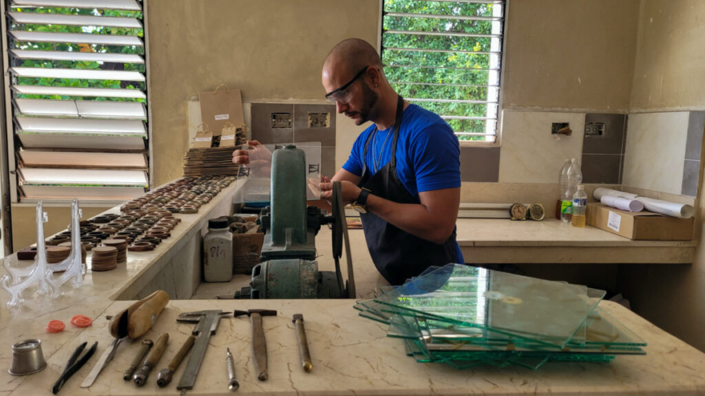 Cuban watchmaker Ivan Gelabert, 32, works at a shop in Havana, Cuba, on 31st October, 2023.