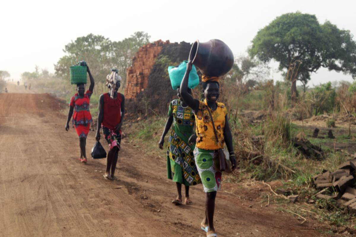 DRC people walking along road