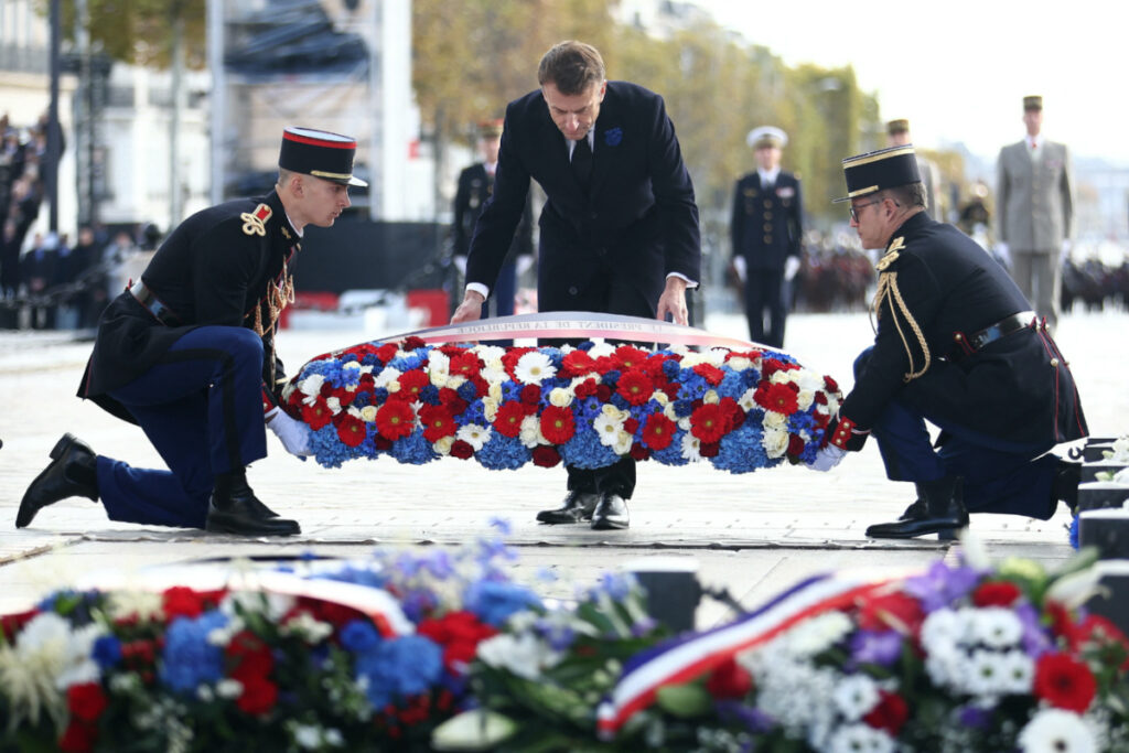 French President Emmanuel Macron lays a wreath during a ceremony at the Tomb of the Unknown Soldier at the Arc de Triomphe in Paris, France on 11th November, 2023