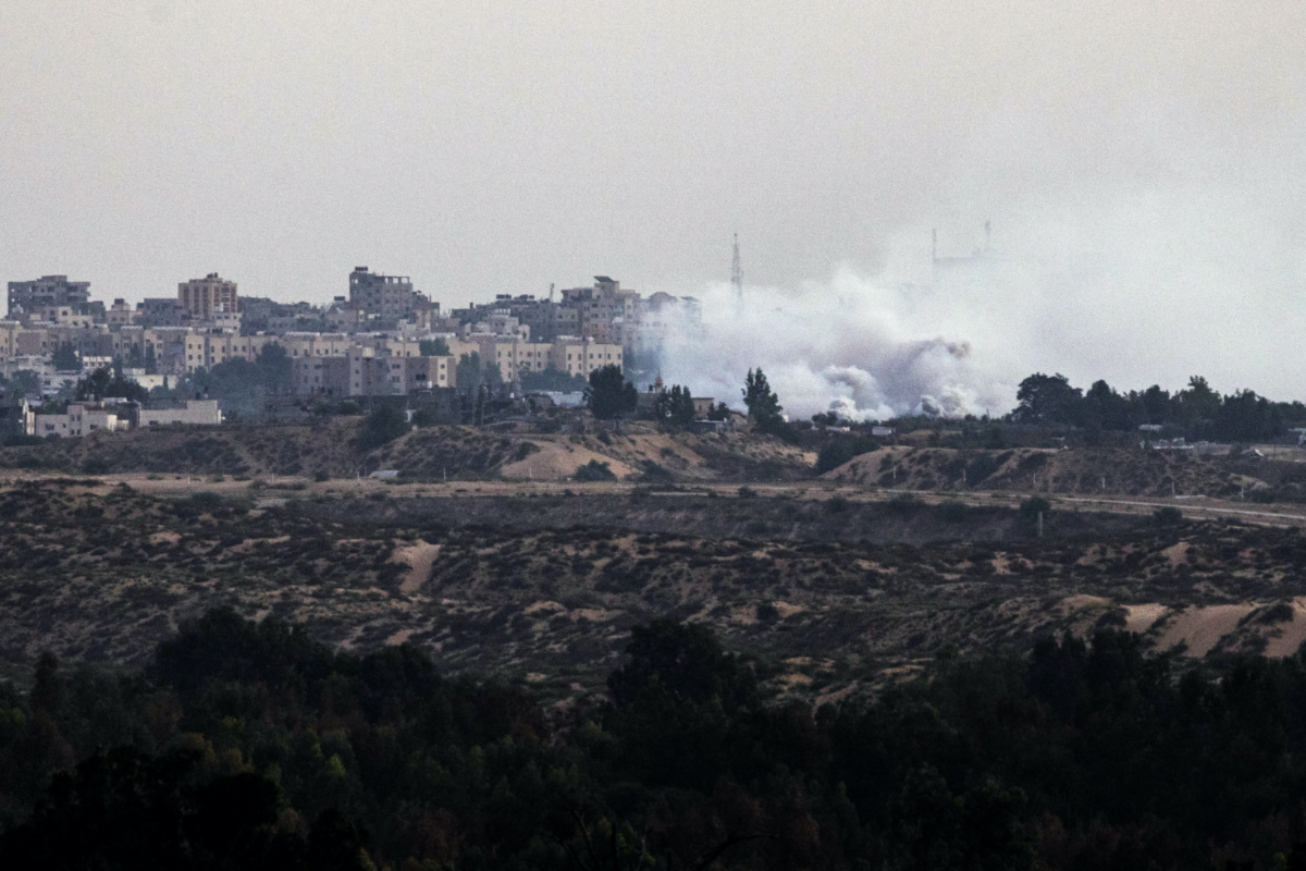 An Israeli tank deploys decoy smoke in the Gaza Strip, amid the ongoing conflict between Israel and the Palestinian Islamist group Hamas, as seen from Israel's border with Gaza in southern Israel, on 4th November, 2023