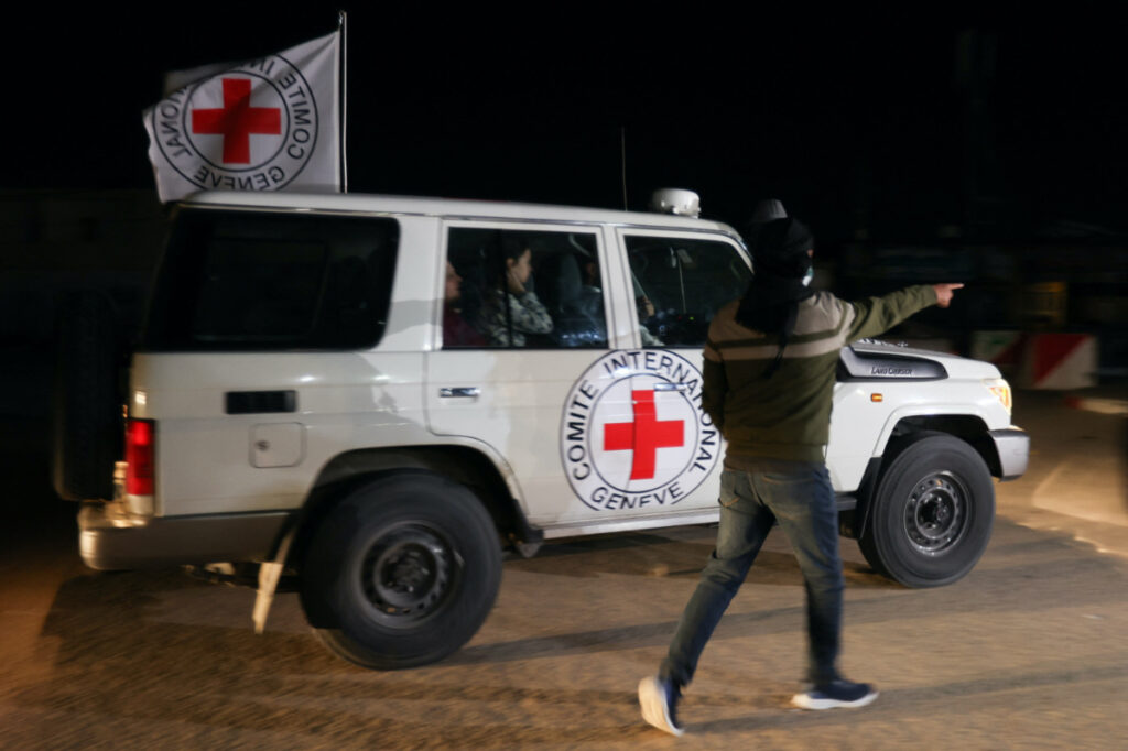 A Red Cross vehicle, as part of a convoy believed to be carrying hostages abducted by Hamas militants during the 7th October attack on Israel, arrives at the Rafah border, amid a hostages-prisoners swap deal between Hamas and Israel, in southern Gaza Strip, on 25th November, 2023.