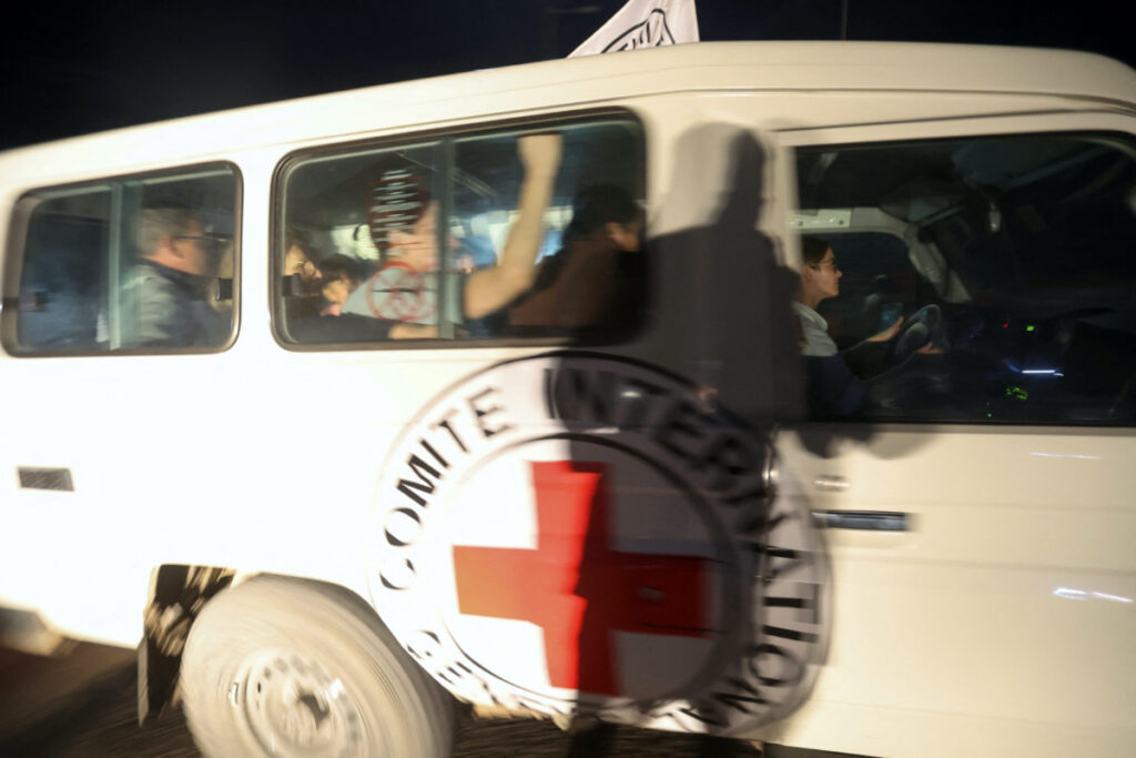 A Red Cross vehicle carrying hostages abducted by Hamas militants during the 7th October attack on Israel, arrives at Rafah border, amid a hostages-prisoners swap deal between Hamas and Israel, in southern Gaza Strip, on 28th November, 2023