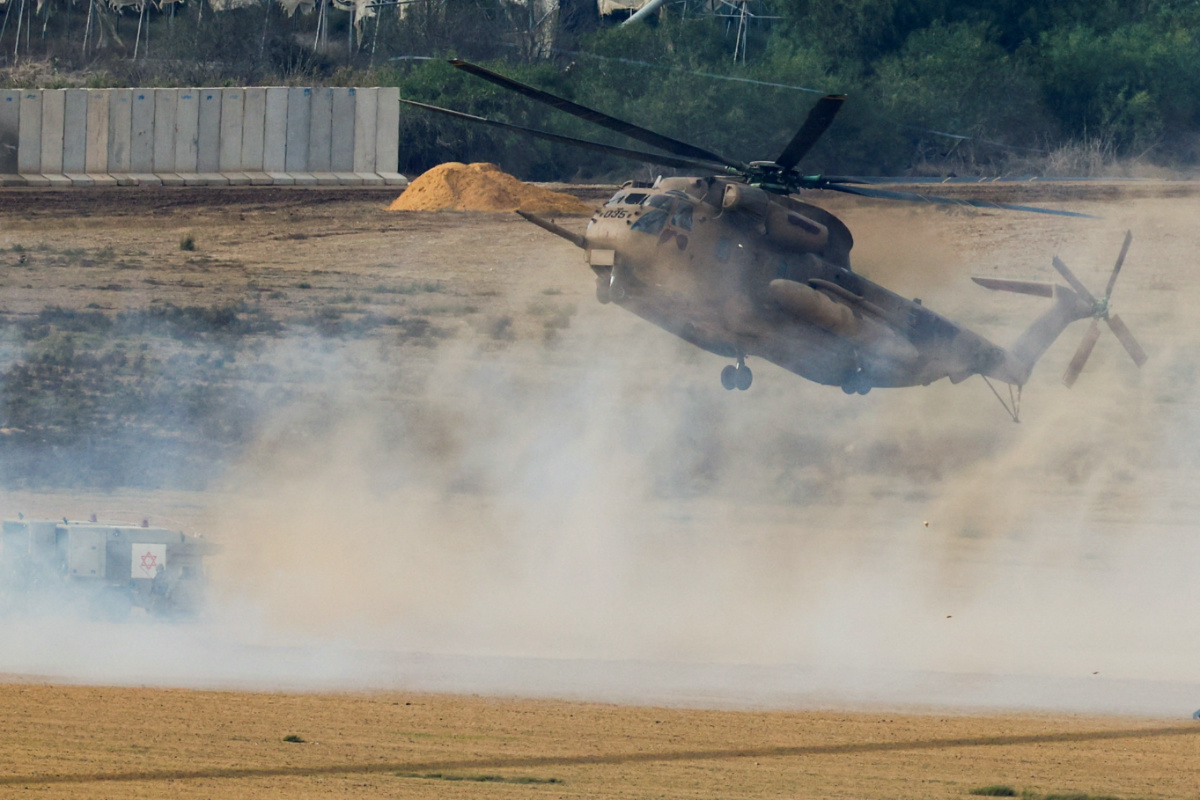 An Israeli military helicopter lands on the Israeli side of the border with Gaza, amid the ongoing conflict between Israel and the Palestinian group Hamas, in southern Israel, on 20th November, 2023. 