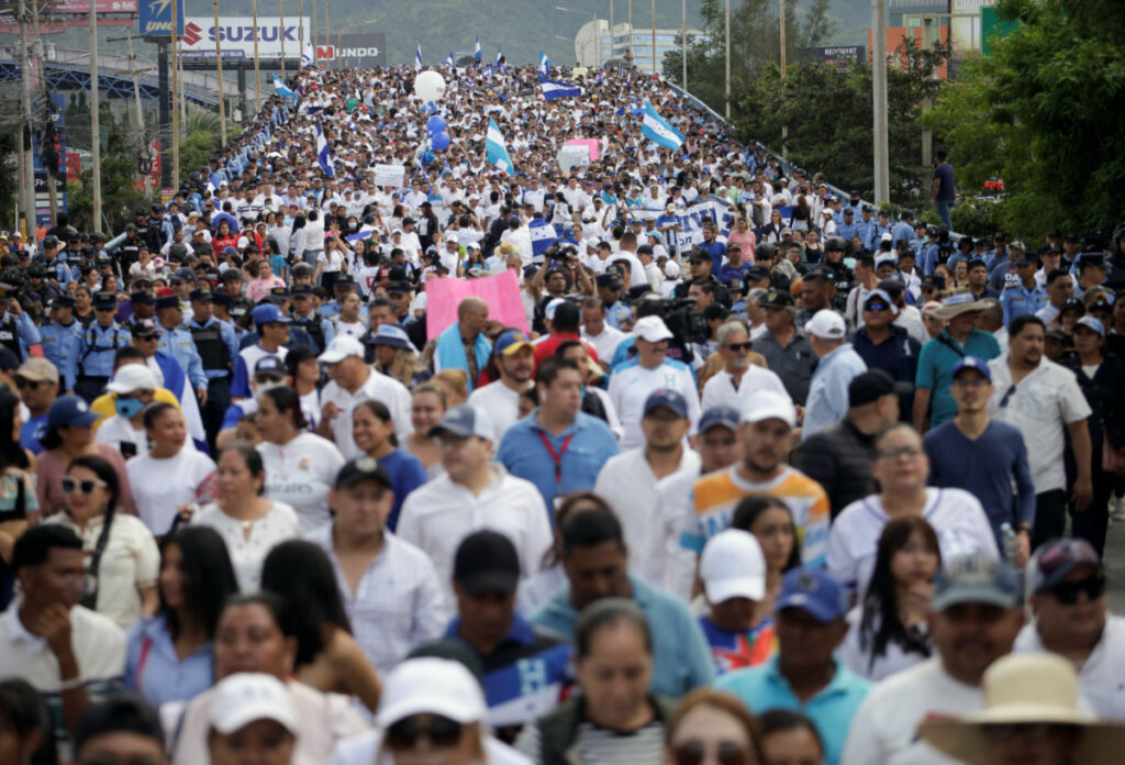 People march during an anti-government protest against Honduras' President Xiomara Castro, in Tegucigalpa, Honduras, on 11th November, 2023