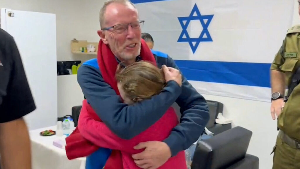 Irish-Israeli girl Emily Hand, who was abducted by Hamas gunmen during the October 7 attack on Israel, meets her father Thomas Hand after being released as part of a hostages-prisoners swap deal between Hamas and Israel amid a temporary truce, at an unknown location in Israel, in this screengrab from a handout video released on 26th November, 2023.
