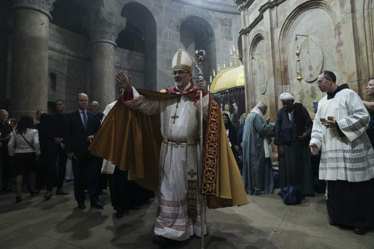 Latin Patriarch of Jerusalem Pierbattista Pizzaballa leads the Easter Sunday Mass at the Church of the Holy Sepulcher, where many Christians believe Jesus was crucified, buried and rose from the dead, in the Old City of Jerusalem, on Sunday, 9th April, 2023