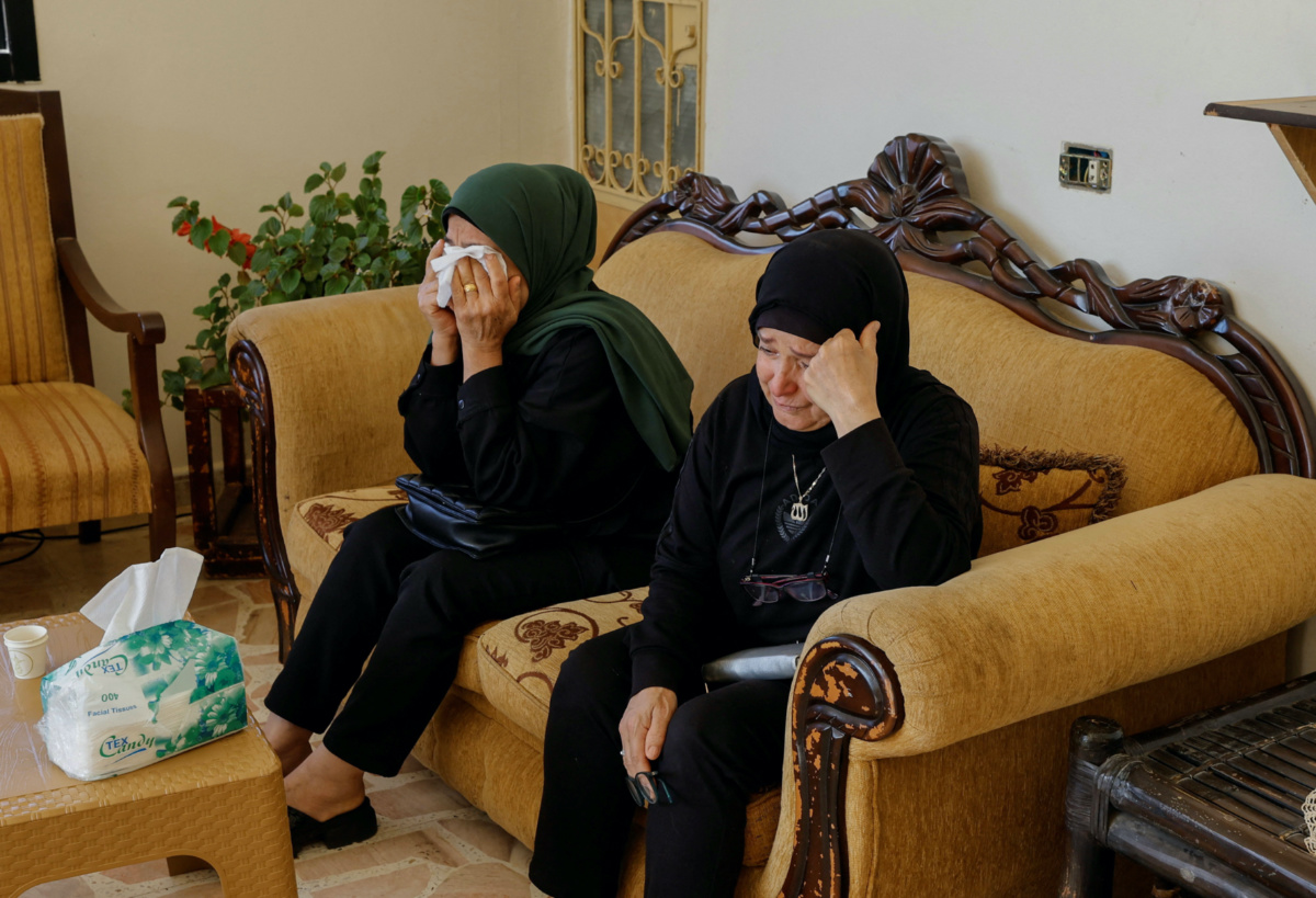 Relatives of the three Lebanese girls killed along with their grandmother yesterday, by what they say was an Israeli airstrike that targeted their car in which they were traveling between Aytaroun and Aynata, mourn them in the southern town of Aynata, Lebanon on 6th November, 2023