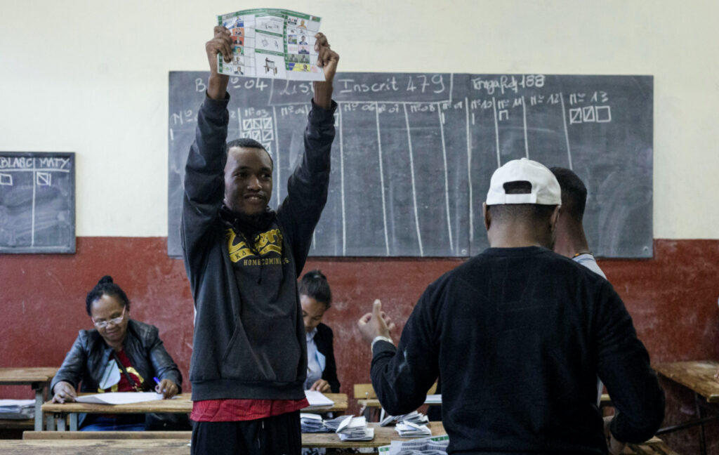 A Madagascan polling agent counts the ballot papers casted at a polling station during the presidential election in Antananarivo, Madagascar, on 16th November, 2023.