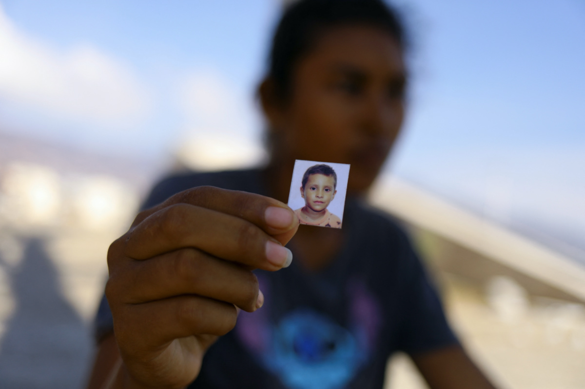Maria del Rosario Saravia Delgado shows the photo of her missing 4-year-old son Luis Alberto Lopez, who is missing with other relatives since Hurricane Otis slammed into Acapulco, in Acapulco, Mexico, November 1, 2023. REUTERS/Jose Luis Gonzalez