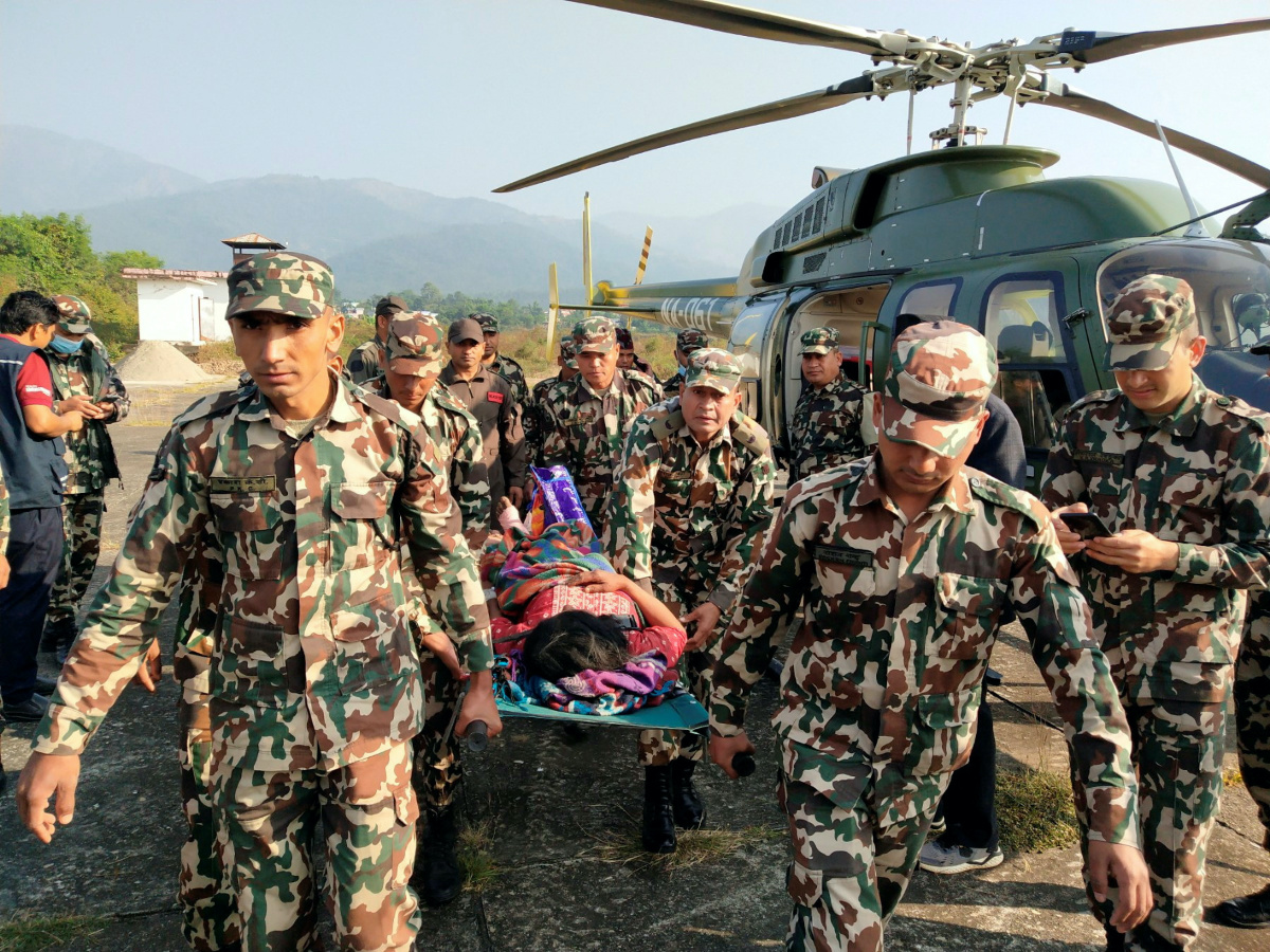 Army personnel carry an injured person on a stretcher after an earthquake in Jajarkot, Nepal, on 4th November, 2023