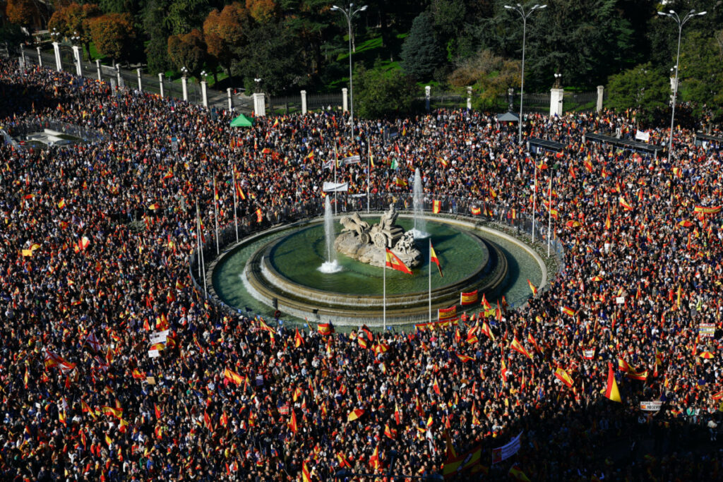 A general view of Cibeles square as people take part in a protest, after Spain's socialists reached a deal with the Catalan separatist Junts party for government support, which includes amnesties for people involved with Catalonia's failed 2017 independence bid, in Madrid, Spain, on 18th November, 2023