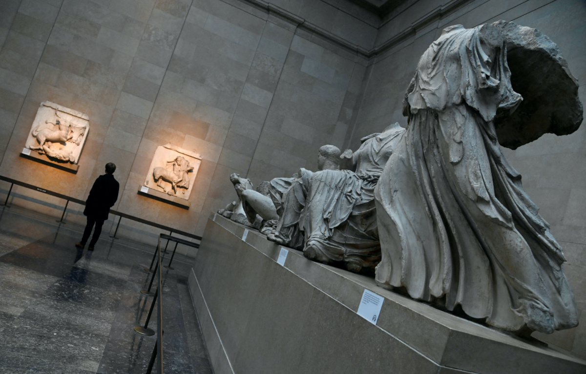 An employee views examples of the Parthenon sculptures, sometimes referred to in the UK as the Elgin Marbles, on display at the British Museum in London, Britain, on 25th January, 2023. 