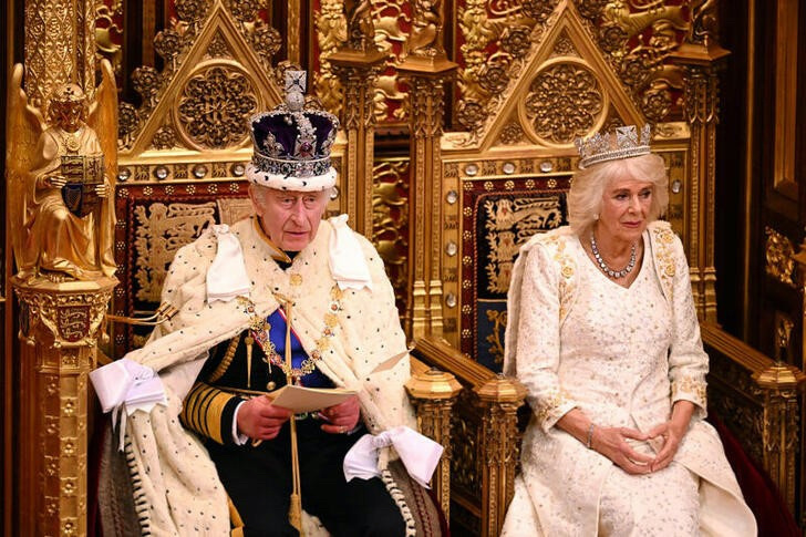 Britain's King Charles III delivers a speech beside Queen Camilla during the State Opening of Parliament in the House of Lords Chamber, in London, Britain, on 7th November, 2023.