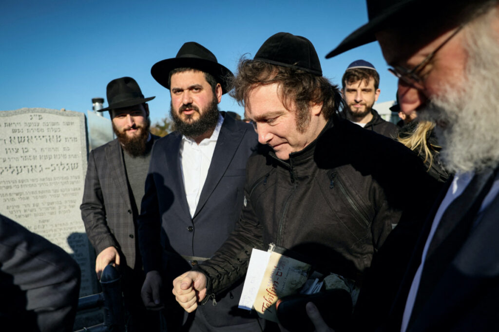 Argentine President-elect Javier Milei visits the resting place of the Lubavitcher Rebbe, Rabbi Menachem M Schneerson at the Old Montefiore Cemetery in the Queens borough of New York City, US, on 27th November, 2023.
