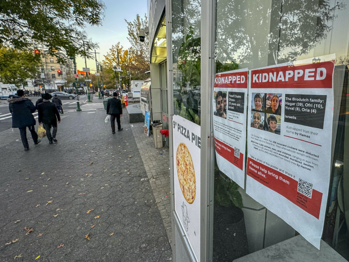 Posters of Israeli hostages being held by Hamas after the militant group's attack on Israel the month before, hang inside a window of the Jewish Children's Museum, on Friday, 3rd November, 2023, in the Brooklyn borough of New York.