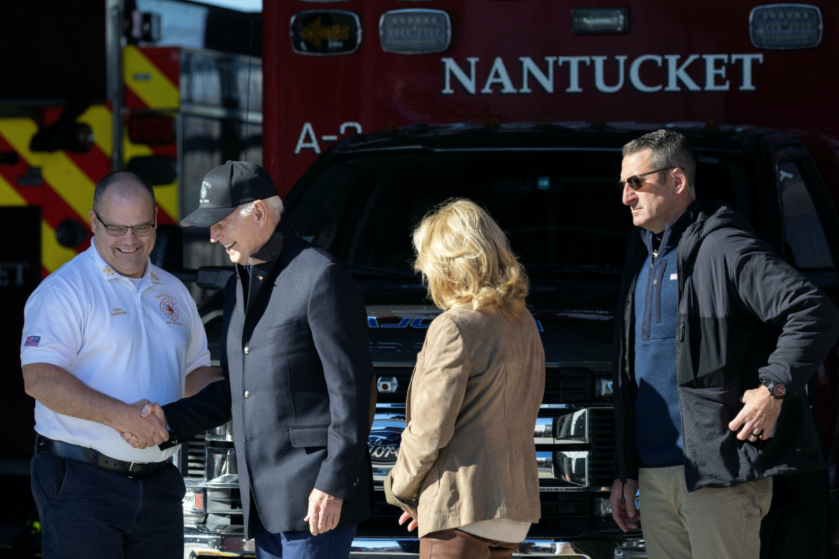 US President Joe Biden greets Nantucket Fire Department Chief Cranson alongside First Lady Jill Biden, at the Nantucket Fire Department in Nantucket, Massachusetts, US, on 23rd November, 2023.