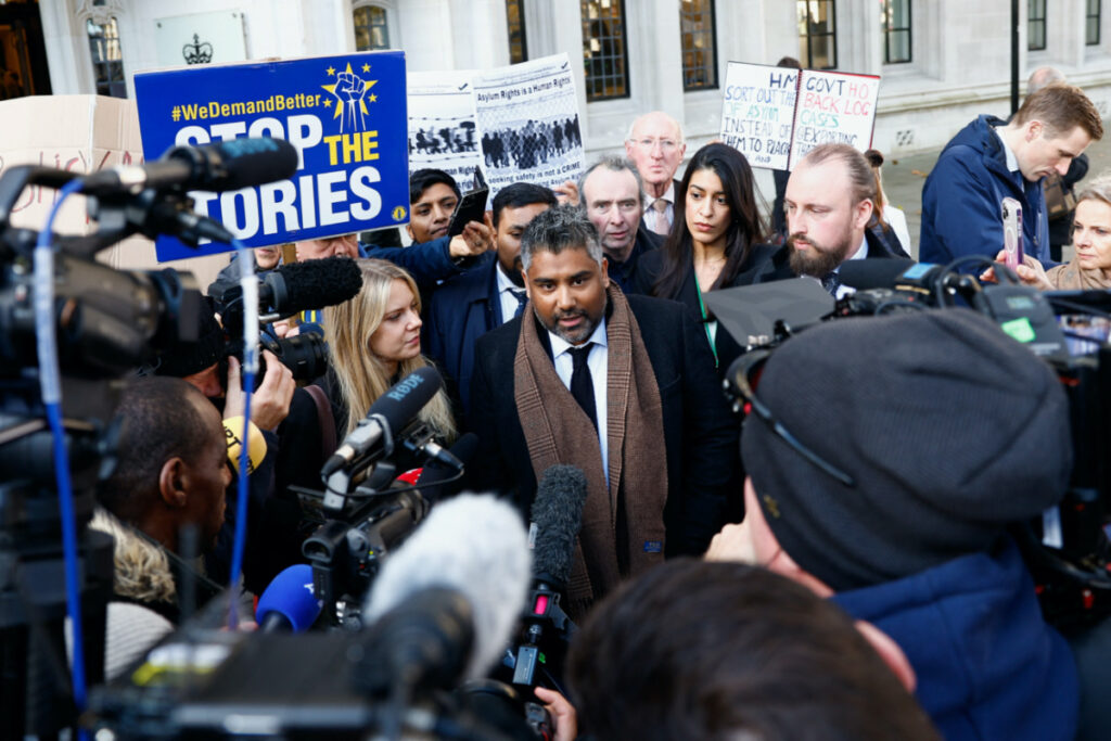 Toufique Hossain representing asylum seekers, speaks to the media outside the Supreme Court following its ruling on whether the government can go ahead with its plan to deport migrants to Rwanda, in London, Britain, on 15th November, 2023