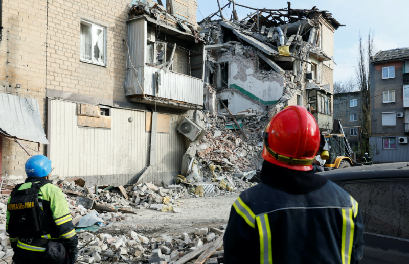 Rescuers look at the site of residential houses heavily damaged by a Russian missile strike, amid Russia's attack on Ukraine, in the town of Selydove, Donetsk region, Ukraine on 15th November, 2023.