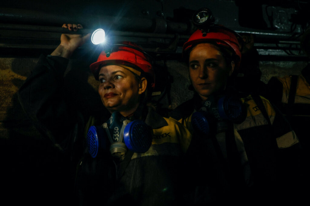 Nataliia, 43-years-old and Krystyna, 22-years-old, go down in an elevator to their underground workplace, amid Russia's attack on Ukraine, at a mine in Dnipropetrovsk region, Ukraine, on 17th November, 2023.