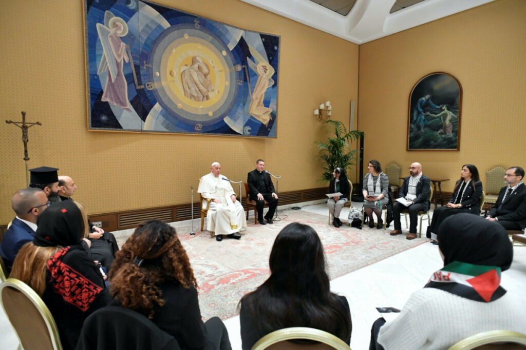 Pope Francis meets with Palestinians whose relatives are stranded in Gaza, amid conflict between Israel and the Palestinian Islamist group Hamas, at the Vatican on 22nd November, 2023.