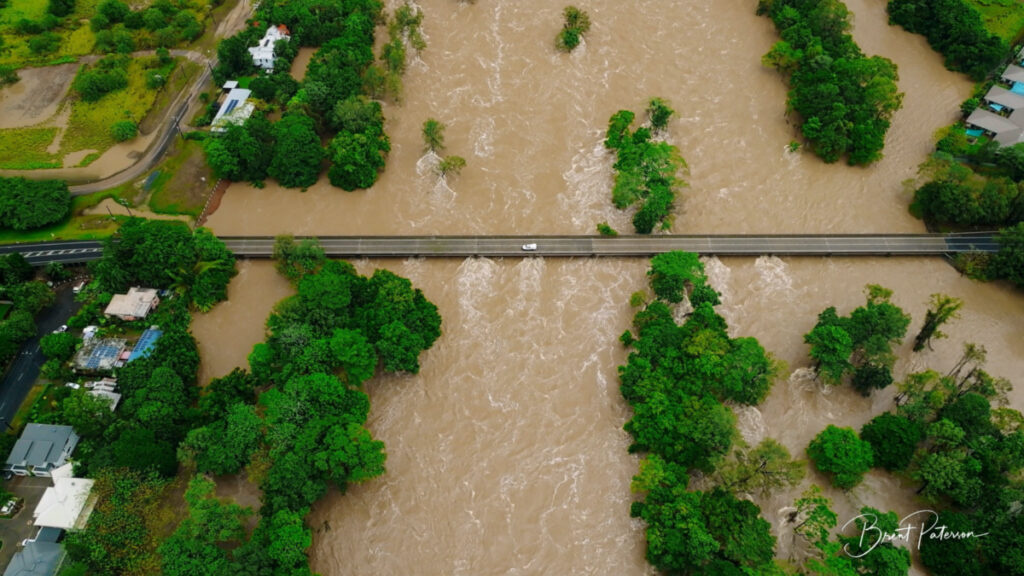 An aerial view shows flooding caused by heavy rains and water gushing through the Barron River, in Cairns, Queensland, Australia, on 18th December, 2023