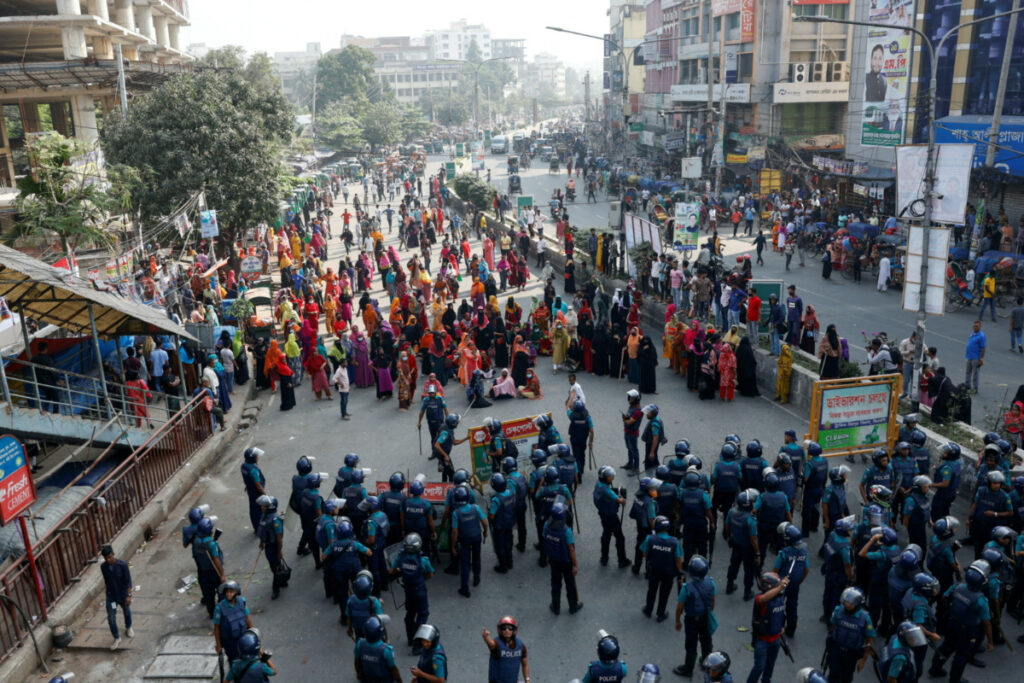 Garment industry workers block a road during a protest demanding a wage raise, in the Mirpur area of Dhaka, Bangladesh, on 12th November, 2023.