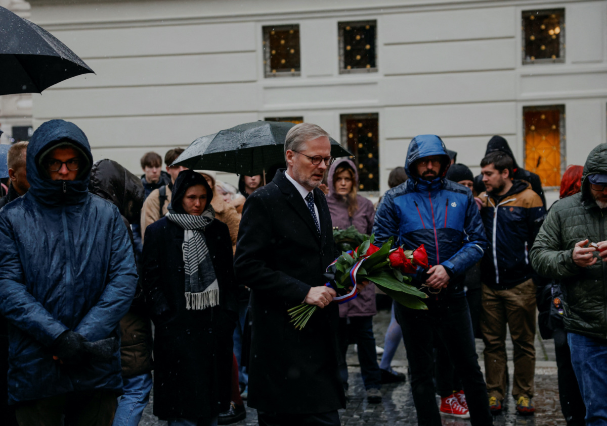 Czech Prime Minister Petr Fiala arrives to place a bouquet during a vigil following a shooting at one of Charles University's buildings in Prague, Czech Republic, on 22nd December, 2023.
