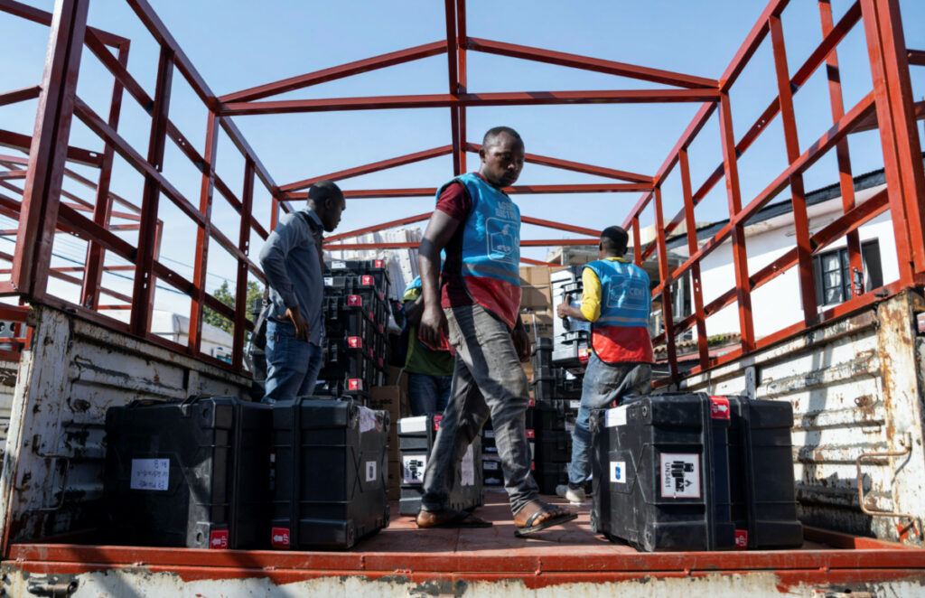 Independent Electoral Commission agents load electoral kits onto trucks for deployment to the polling locations ahead of the Presidential election in Goma, North Kivu province, Democratic Republic of Congo on 19th December, 2023