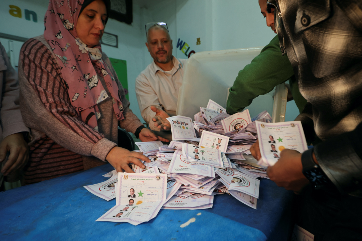 Election officials count ballots inside a school used as a polling station and a counting centre, during the presidential election in Cairo, Egypt, on 12th December, 2023