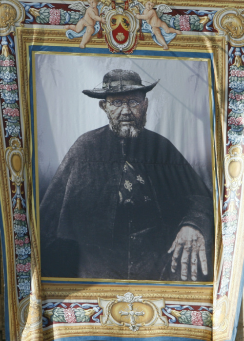 A tapestry depicting Father Damien, born as Joseph De Veuster, hanging from the St Peter Basilica facade during a canonisation ceremony in St Peter's Square at the Vatican, on 11th October, 2009.