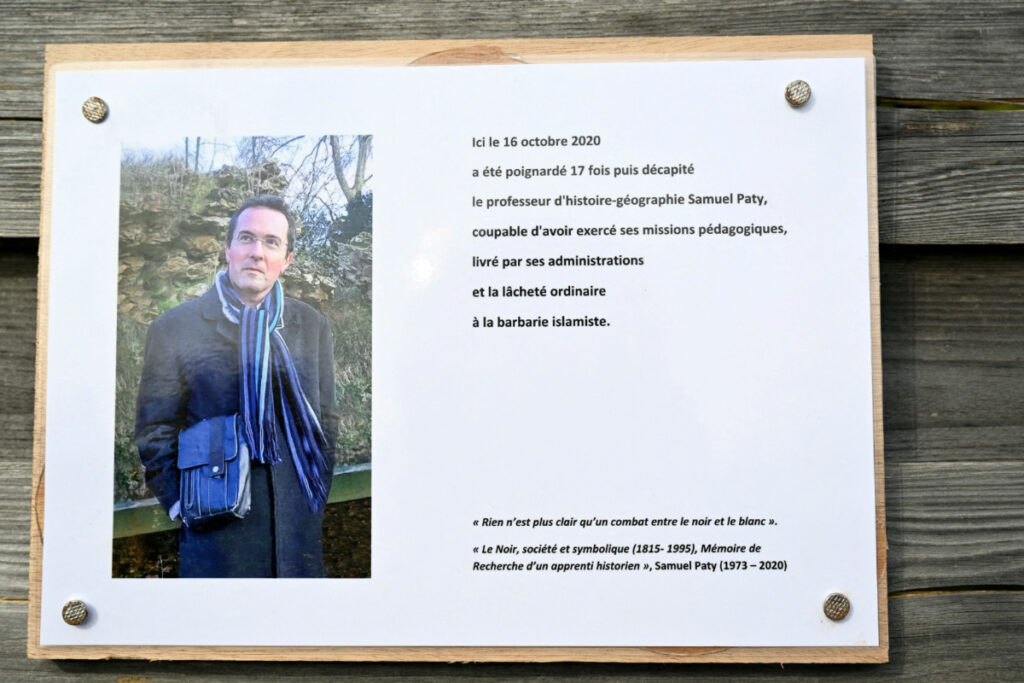 A photograph taken on 16th October, 2023, shows a commemorative plaque for slain teacher Samuel Paty near the Bois d'Aulne school in Conflans-Sainte-Honorine, outside Paris.
