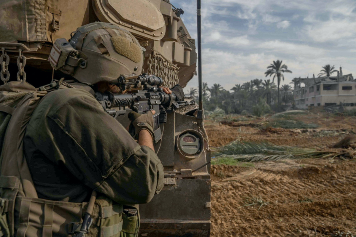 An Israeli soldier operates in the Gaza Strip amid the ongoing conflict between Israel and the Palestinian Islamist group Hamas, in this handout picture released on 14th December , 2023.